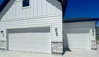 Side of house with double garage door