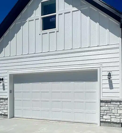 Side of house with double garage door